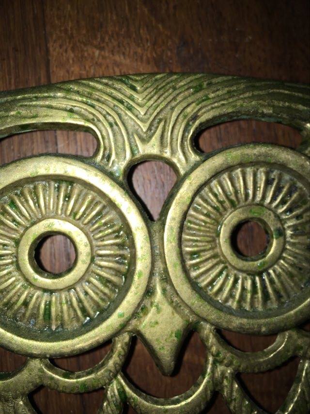 Under the nice brass dish.