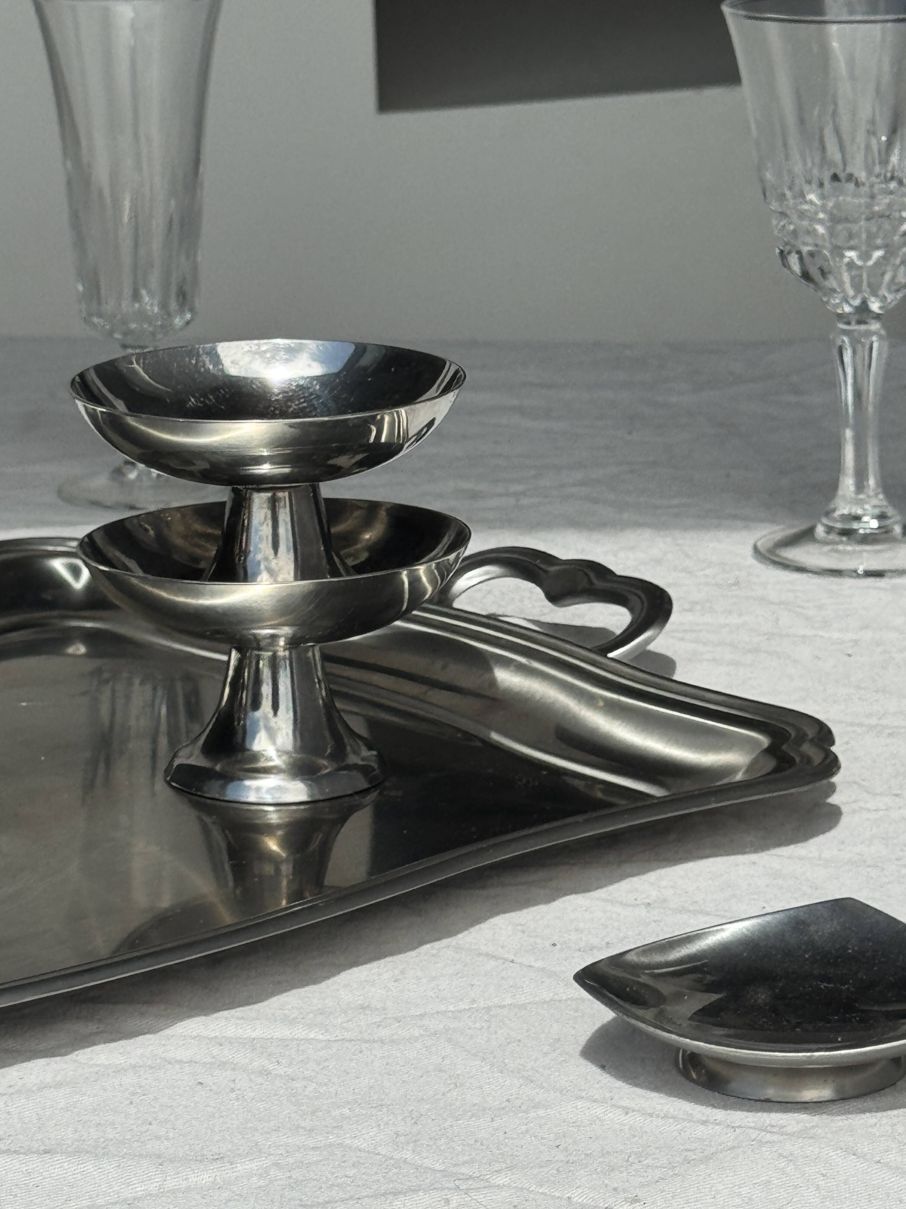 Guy Degrenne silver stainless steel serving tray with an eventful shape