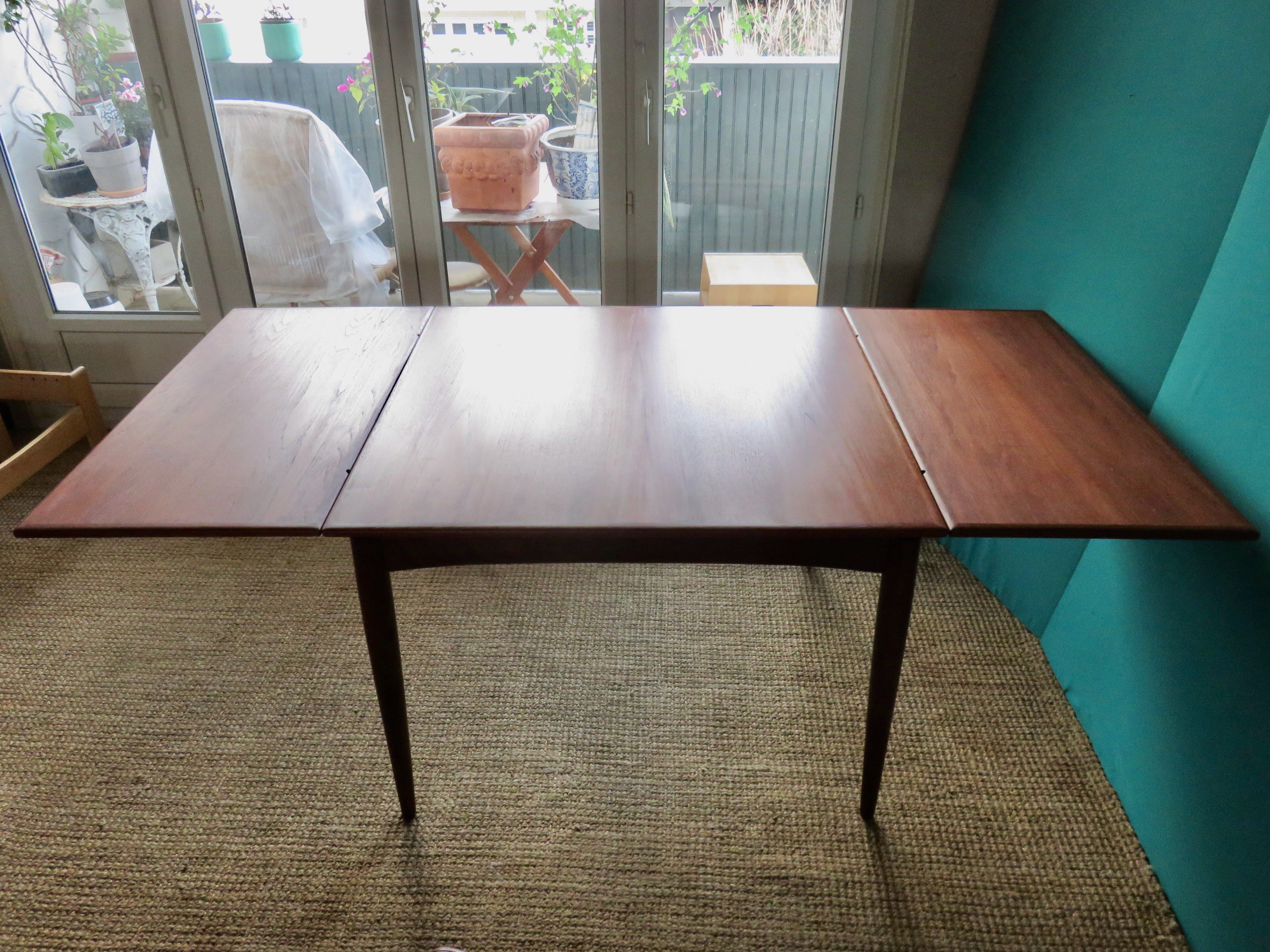Square table in teak with extensions. Denmark 1960
