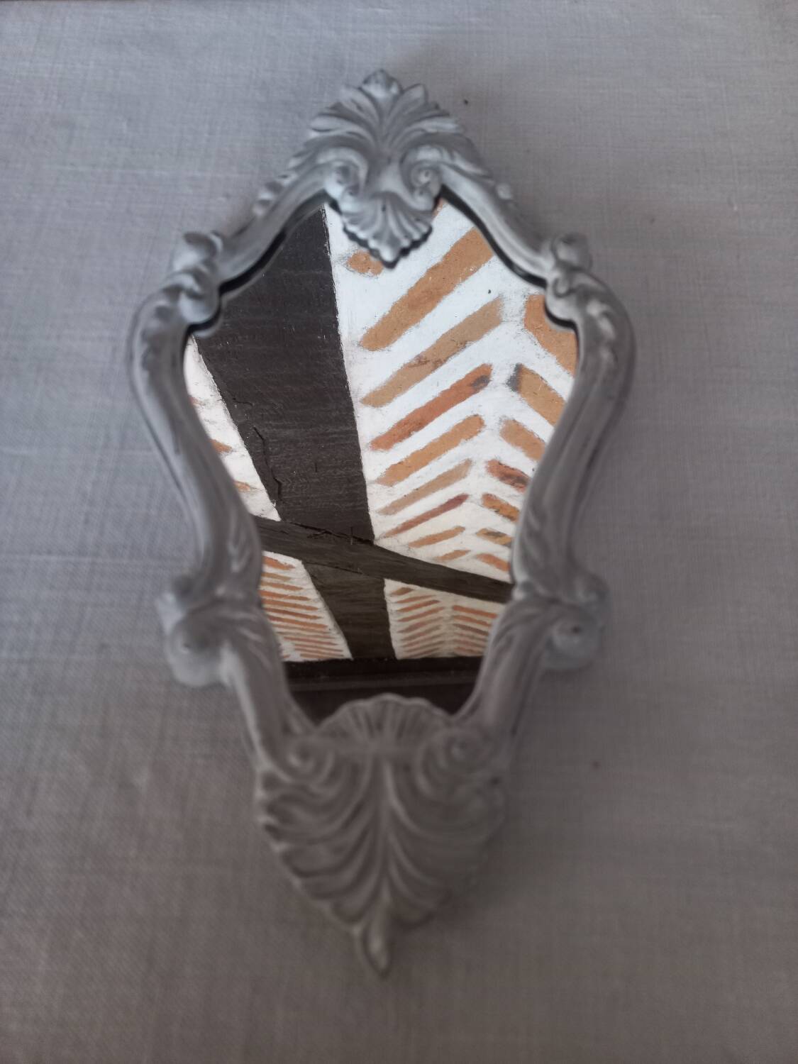 Small patinated baroque mirror