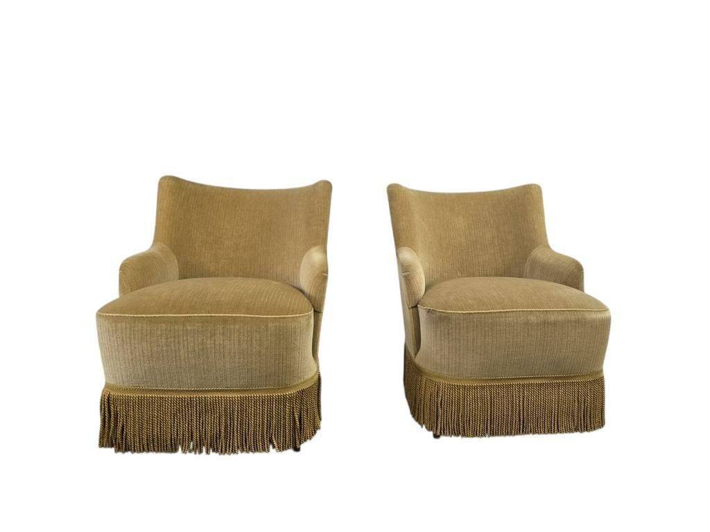 Set of 2 vintage 'gold' armchairs with fringes.