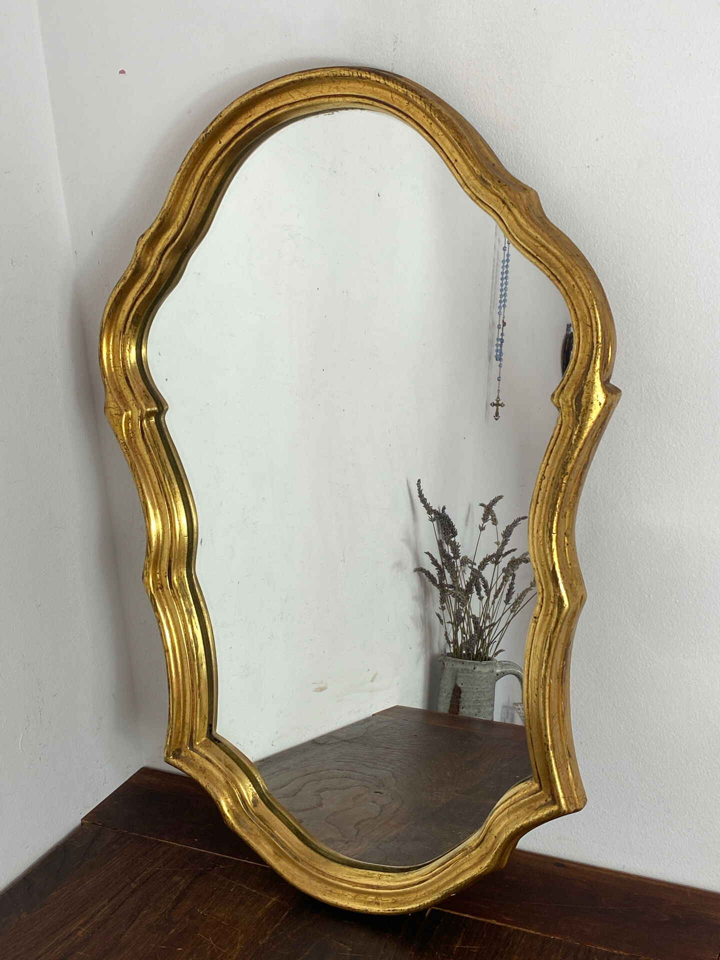 Large baroque mirror in gilded wood