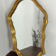 Large baroque mirror in gilded wood