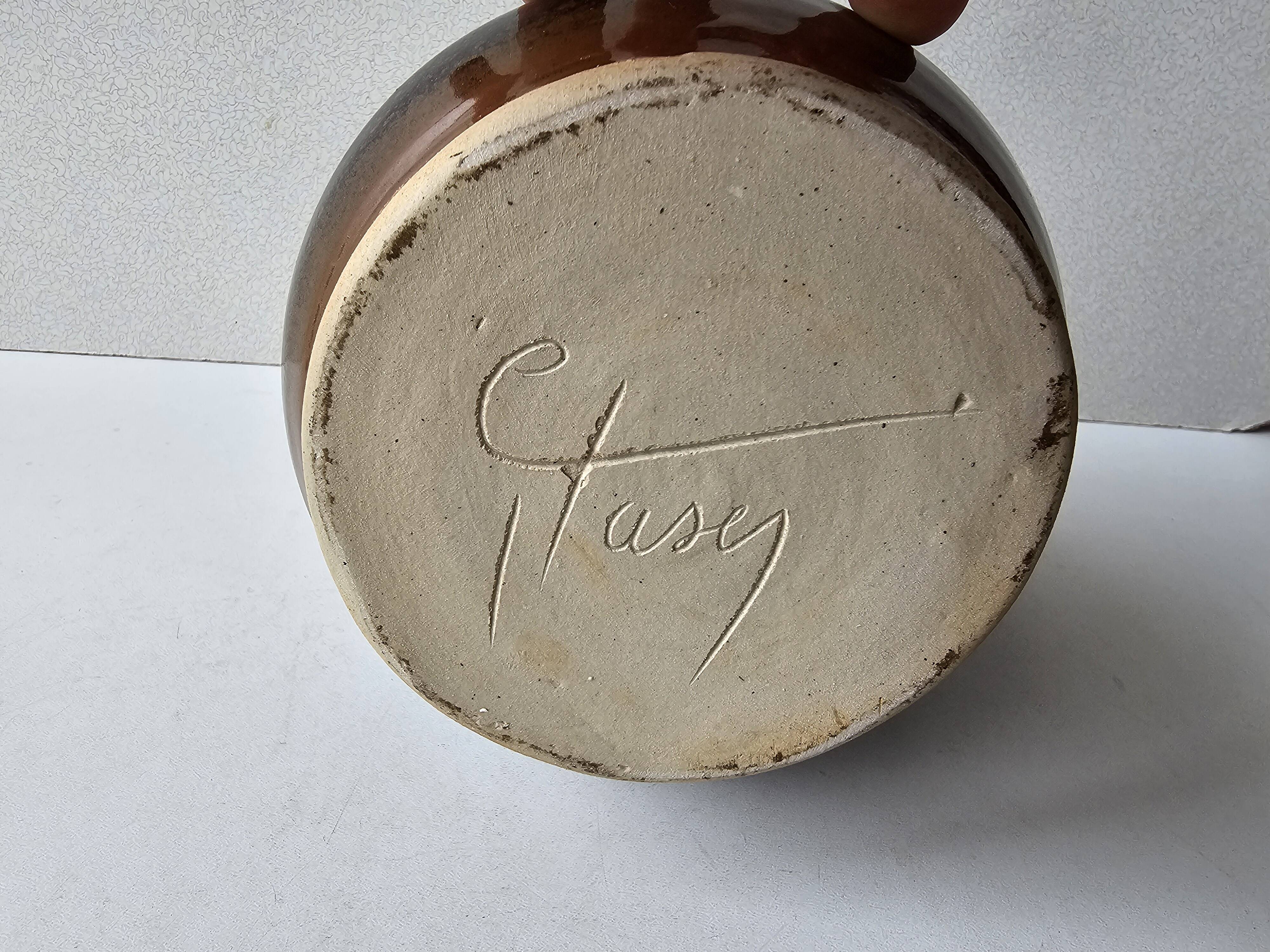 Glazed ceramic pitcher signed C - Tasey