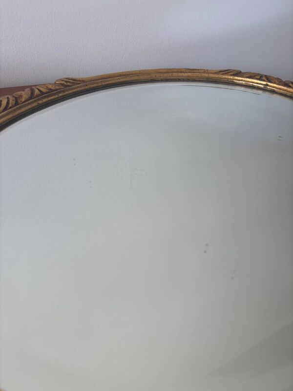 Miroir ovale ancien en bois et stuc doré style Louis XV