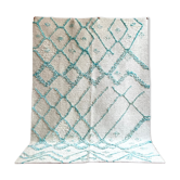 Berber cream carpet with blue pattern