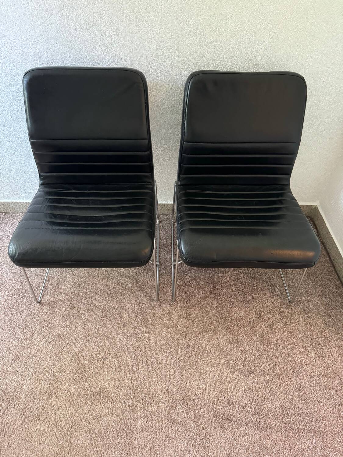 Black leather armchairs, Italian design, 70s (X2)