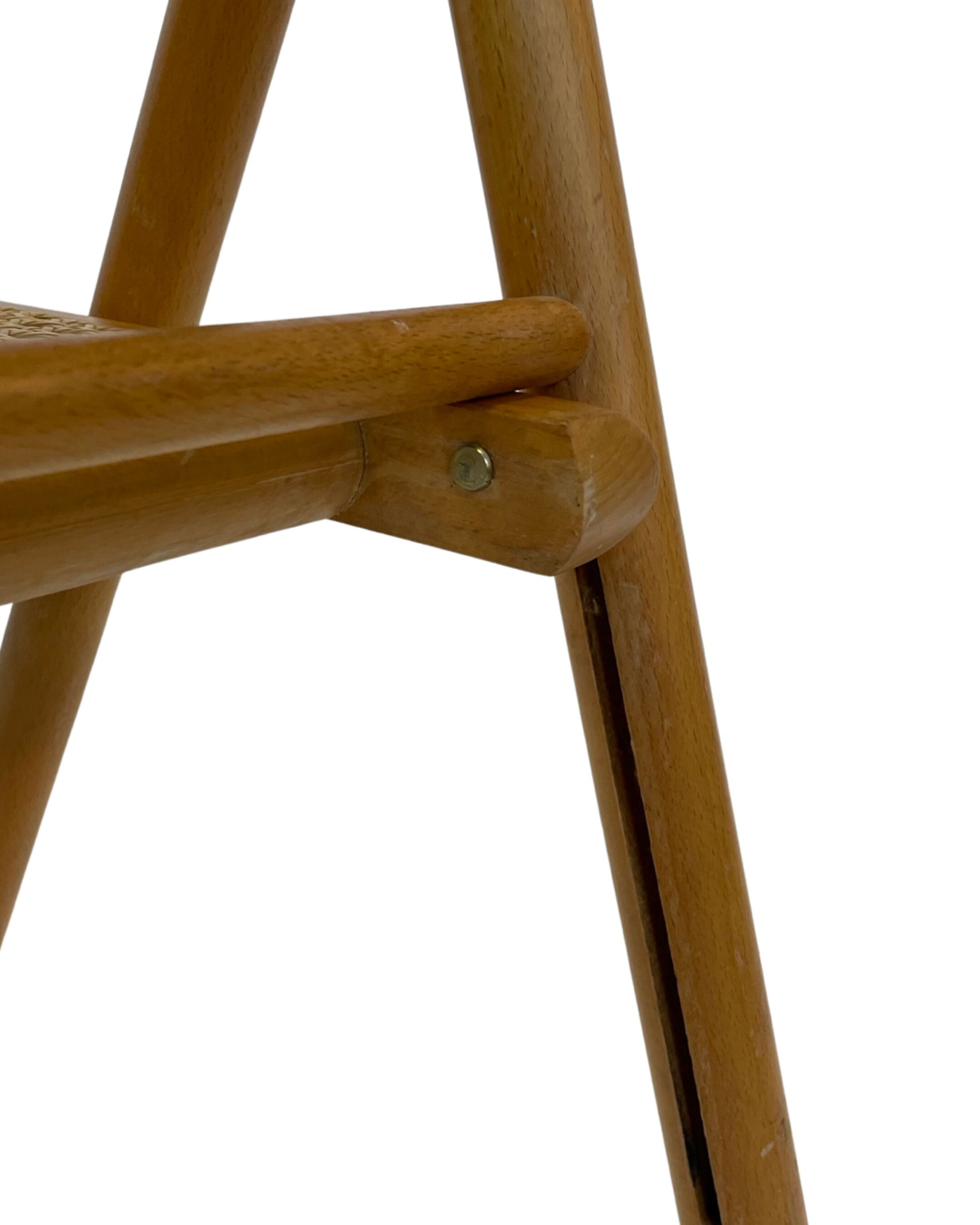 Set of four vintage folding chairs with webbing and wood 1970s