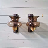 Pair of wall sconces in brass and smoked glass, 1960s.