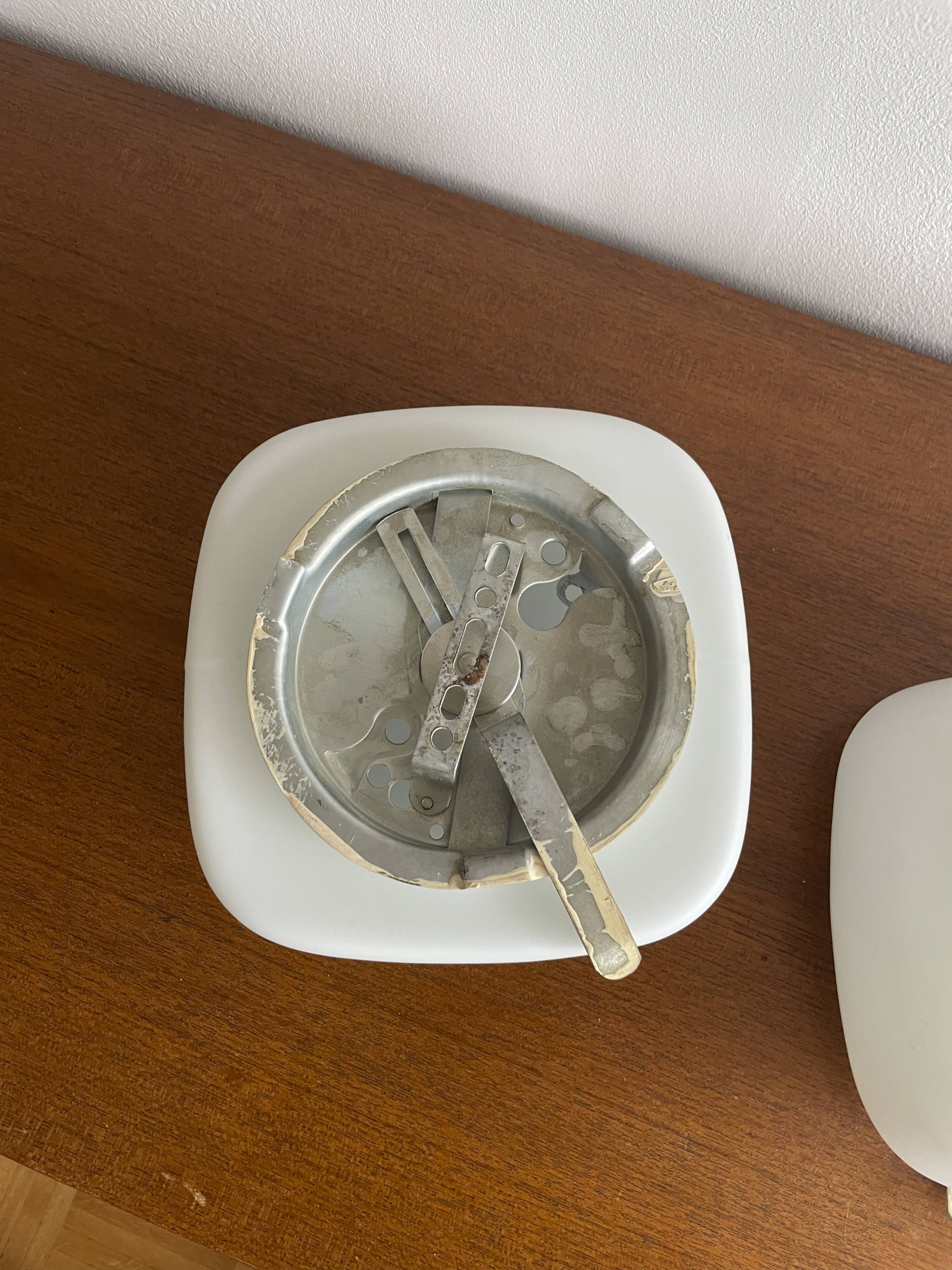 Square wall lights in sandblasted white glass