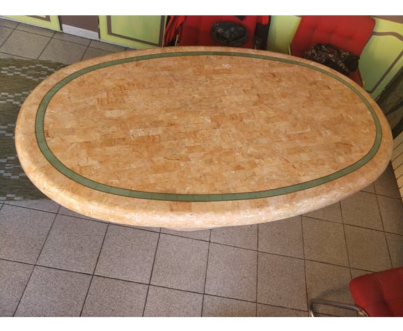 Ovoid table in pink and green travertine, circa 1975