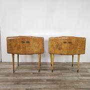 Pair of maple bedside tables from the 1950s with mirrored tops.