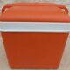 Glaciere vintage de couleur orange avec poignet  de marque EDA