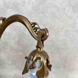 Art Nouveau wall sconces with opalescent iridescent glass