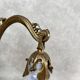 Art Nouveau wall sconces with opalescent iridescent glass