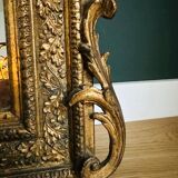 Miroir doré en bois