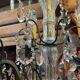 Bronze and cut crystal chandelier with 6 lights, early 20th century work.