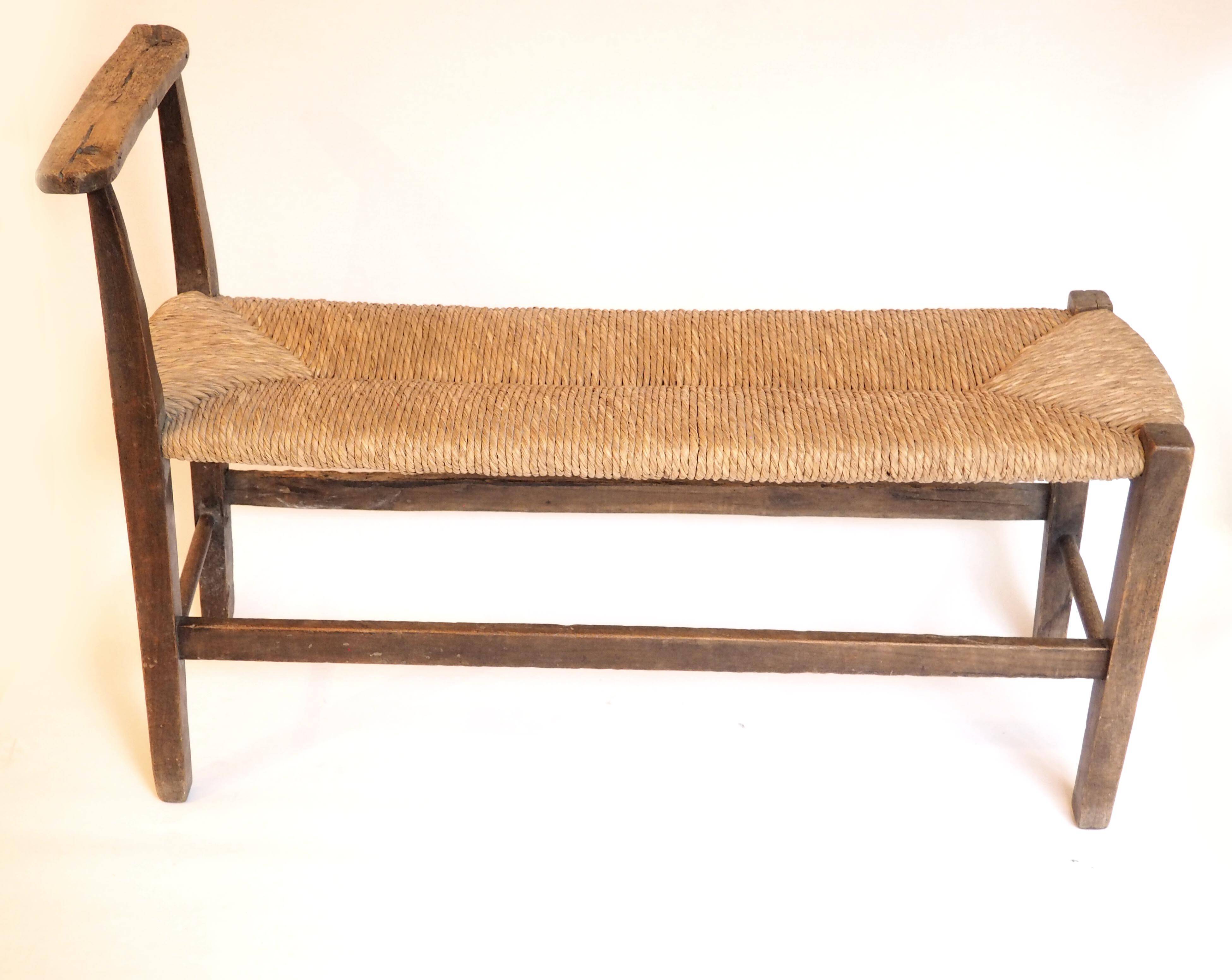 Straw and old wood bench