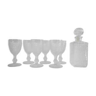 Vintage molded glass foot glasses and carafe from the years 60