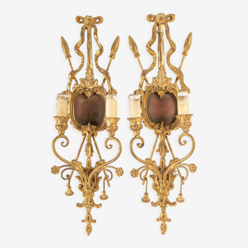 Pair of carved and gilded wood appliques, italian work