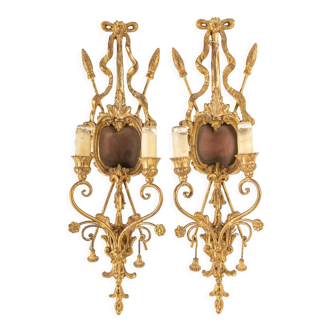 Pair of carved and gilded wood appliques, italian work