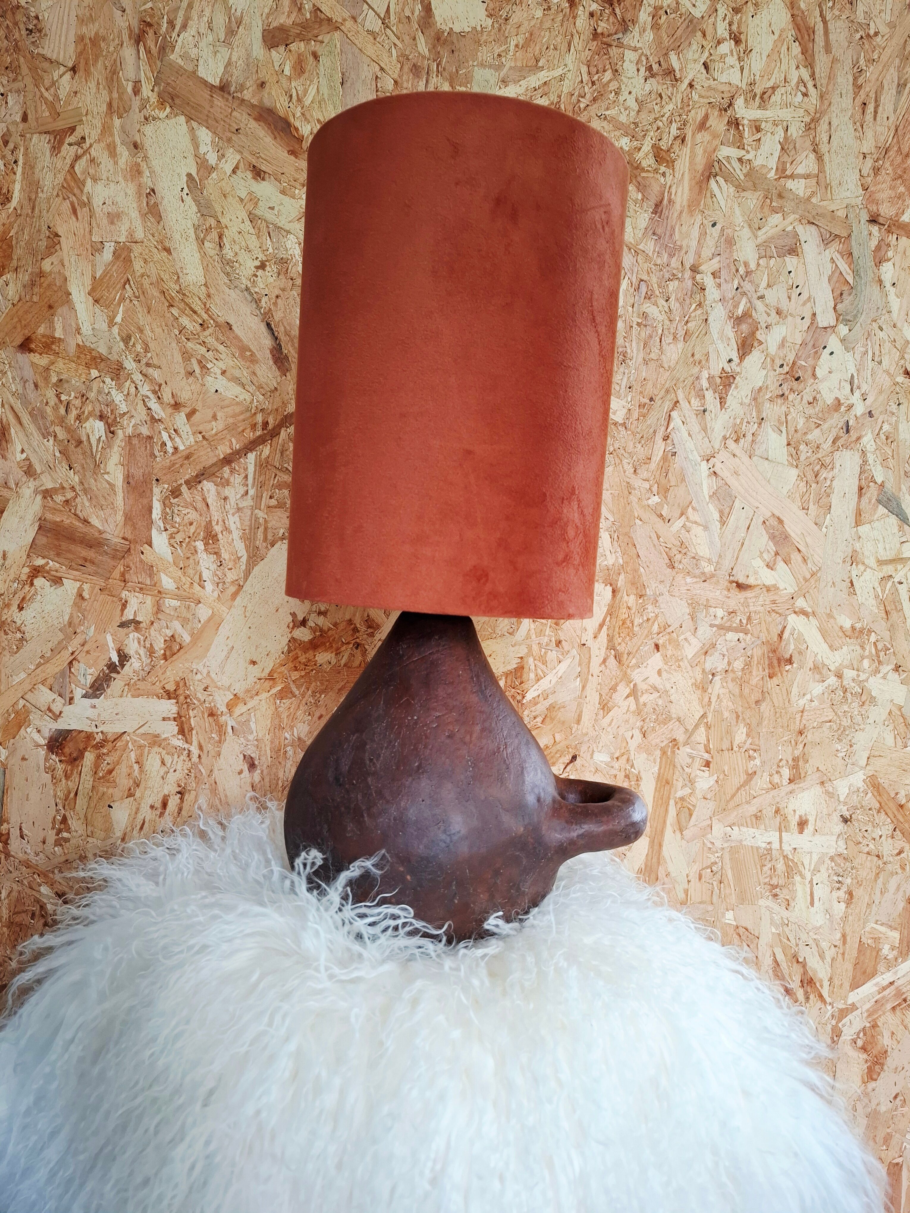 Lampe en terre cuite ancienne