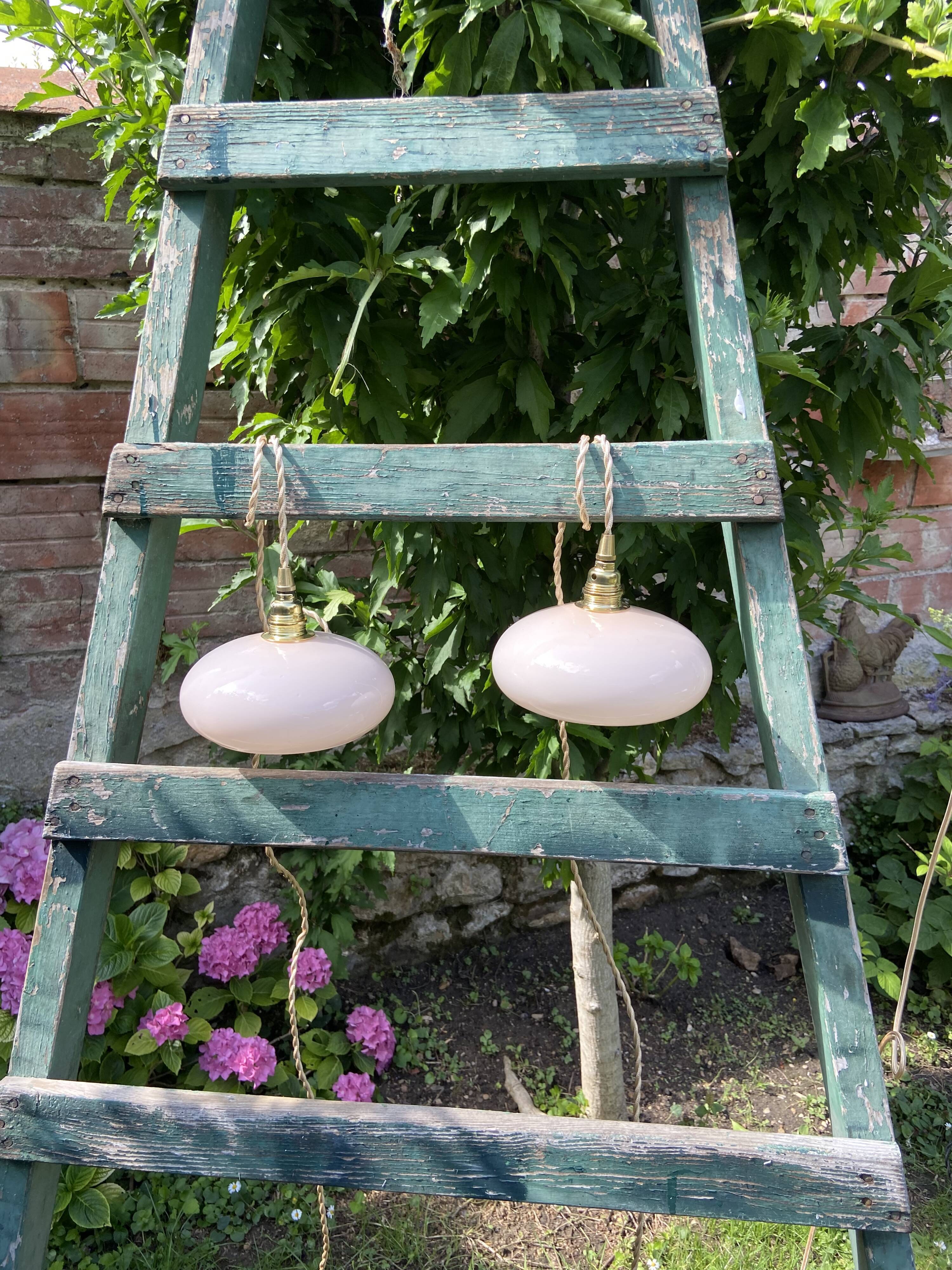 Vintage powder pink opaline globe player 1950