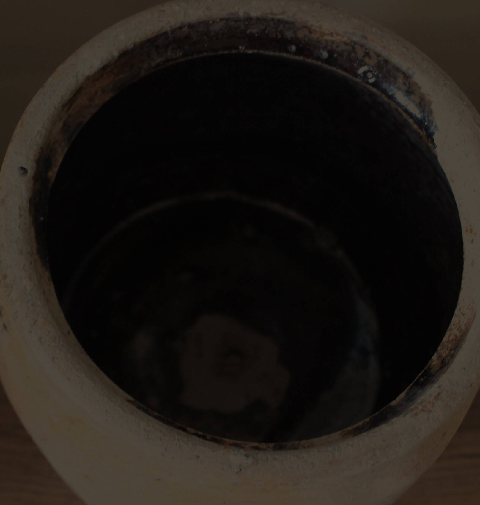 Large round terracotta pot with handle