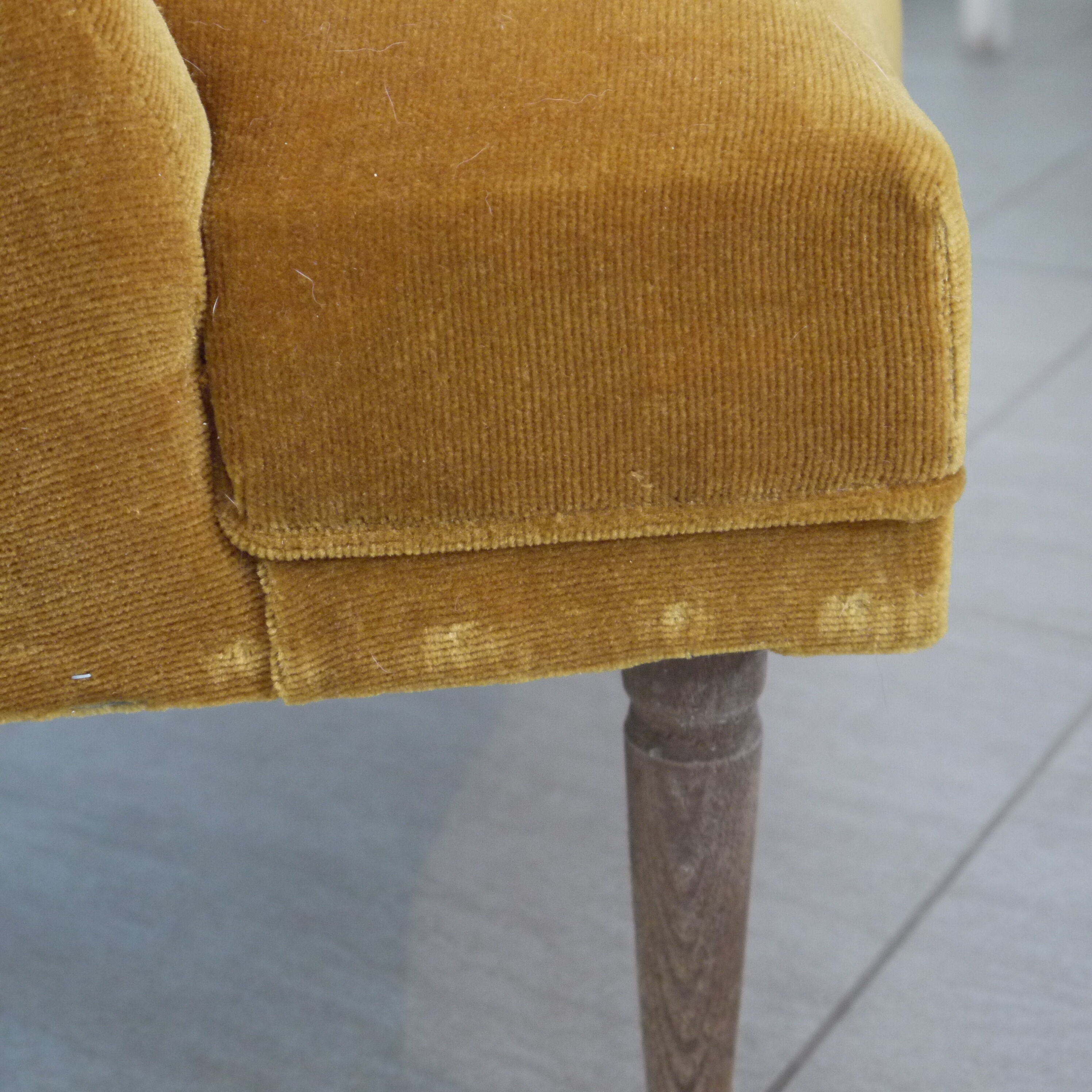 Yellow velvet padded toad armchair