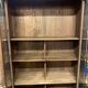 Black bookcase with glass doors