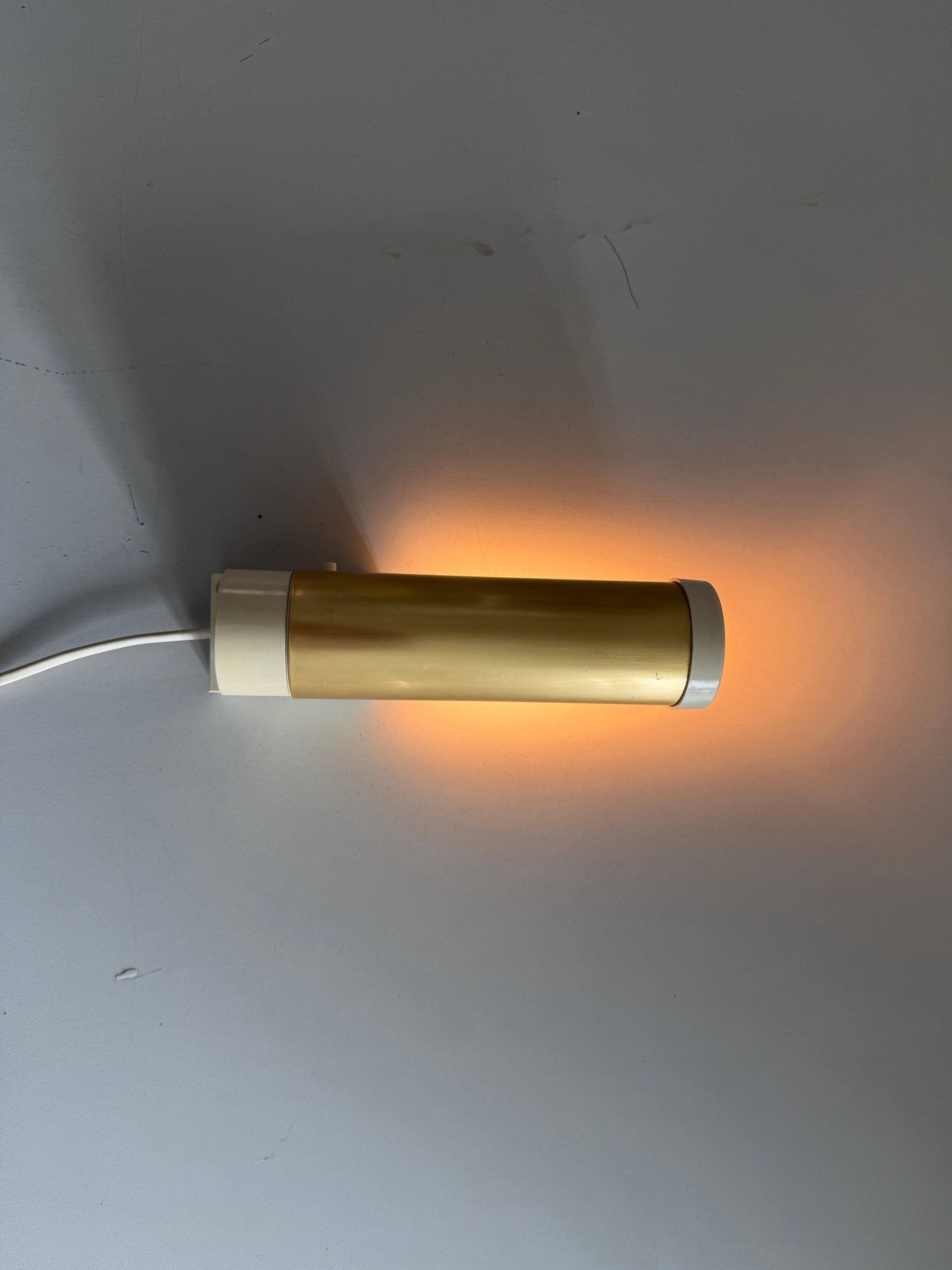 Simple wall light in plexiglass and metal by ERCO, 1970s, Germany.