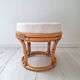 Rattan and terry fabric pouf