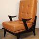 Paire de fauteuils vintage années 50 en bois noir et cuir caramel