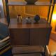 Italian footcase bookcase from the 60s in teak and metal