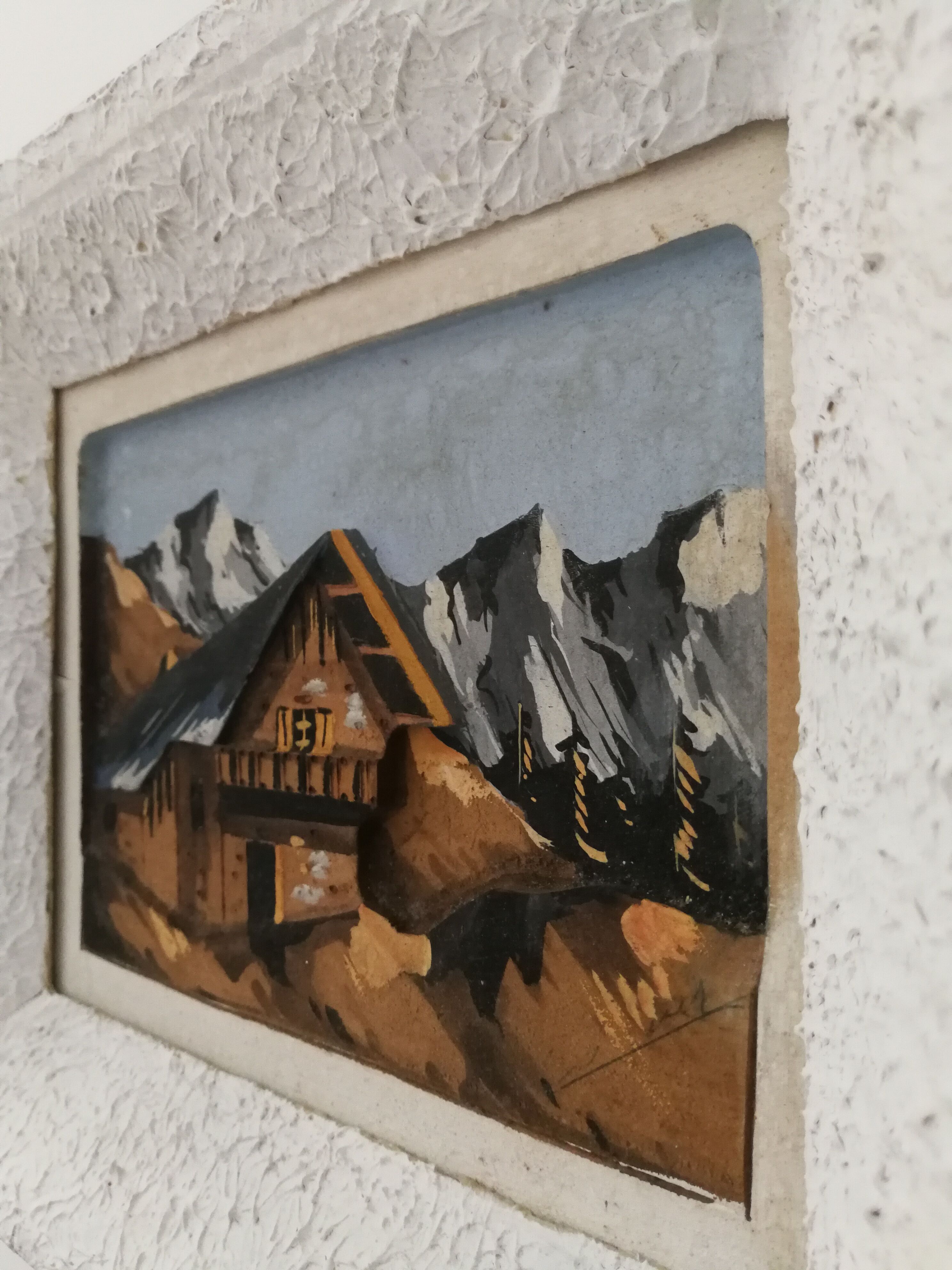 Cadre d'un chalet à la montagne en relief