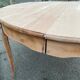 Renovated round dining table in solid wood, Louis XV style from the 19th century.