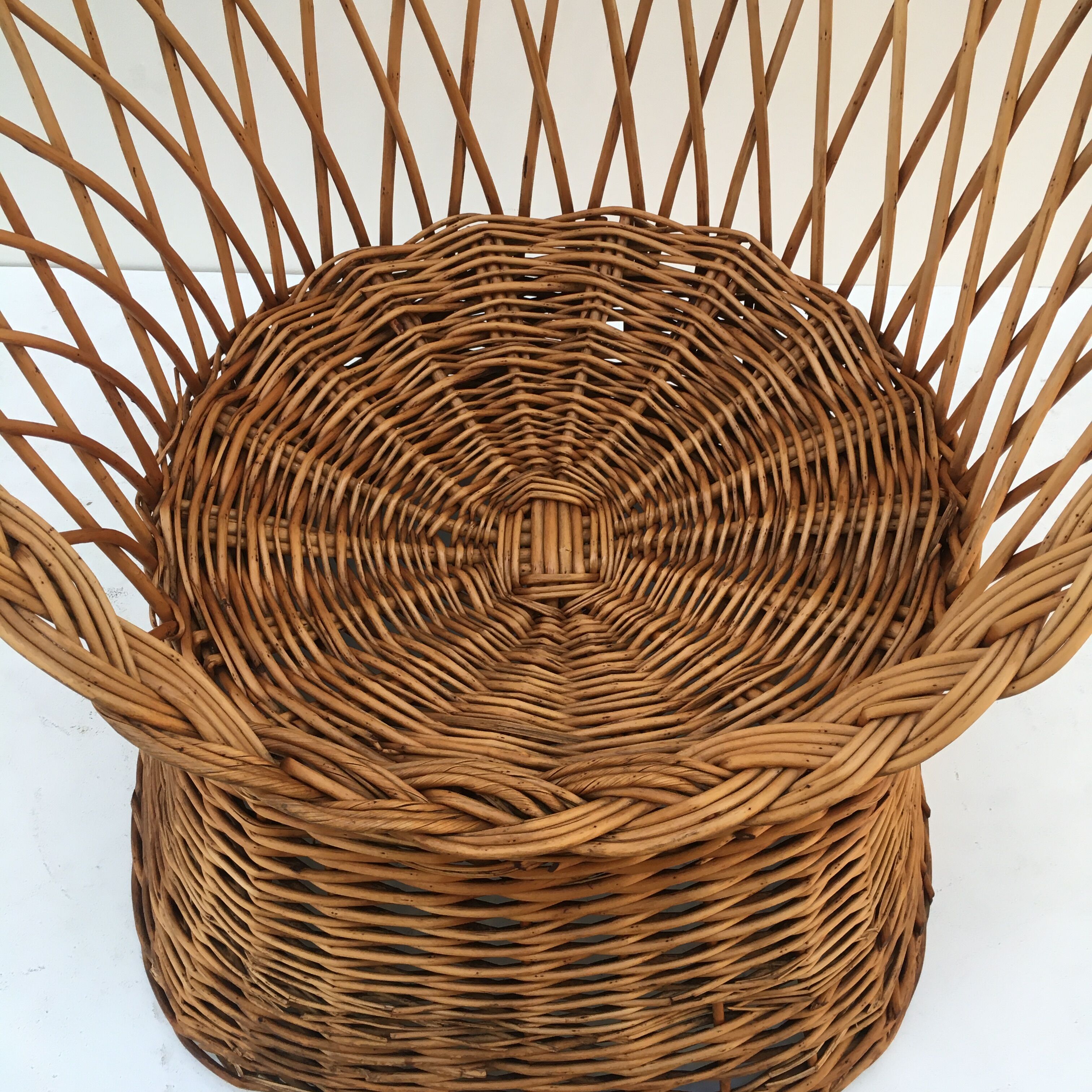 Braided wicker throne armchair