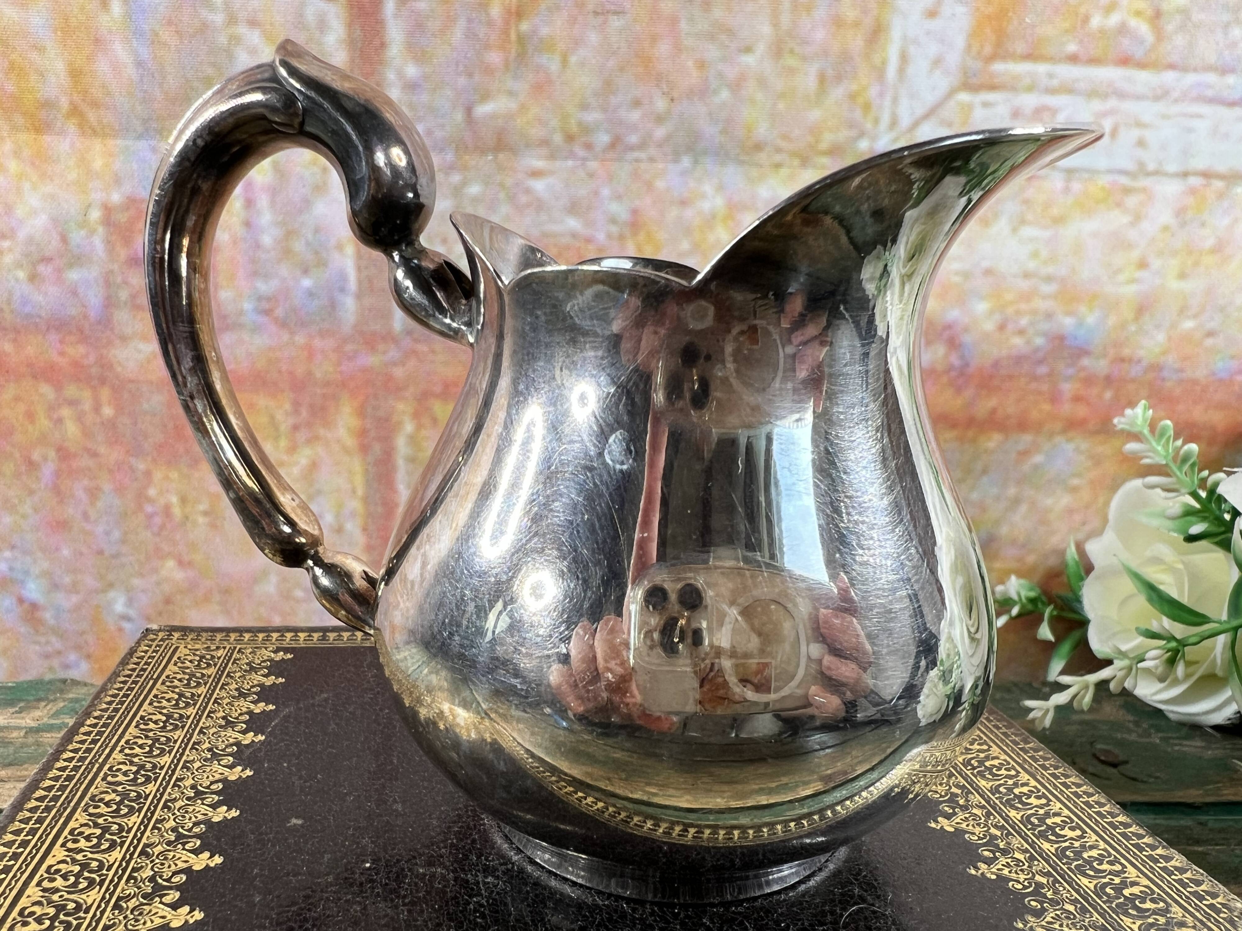 Small Christofle silver-plated metal ewer – Baluster model – France, 20th century