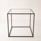 Designer coffee table in metal and glass