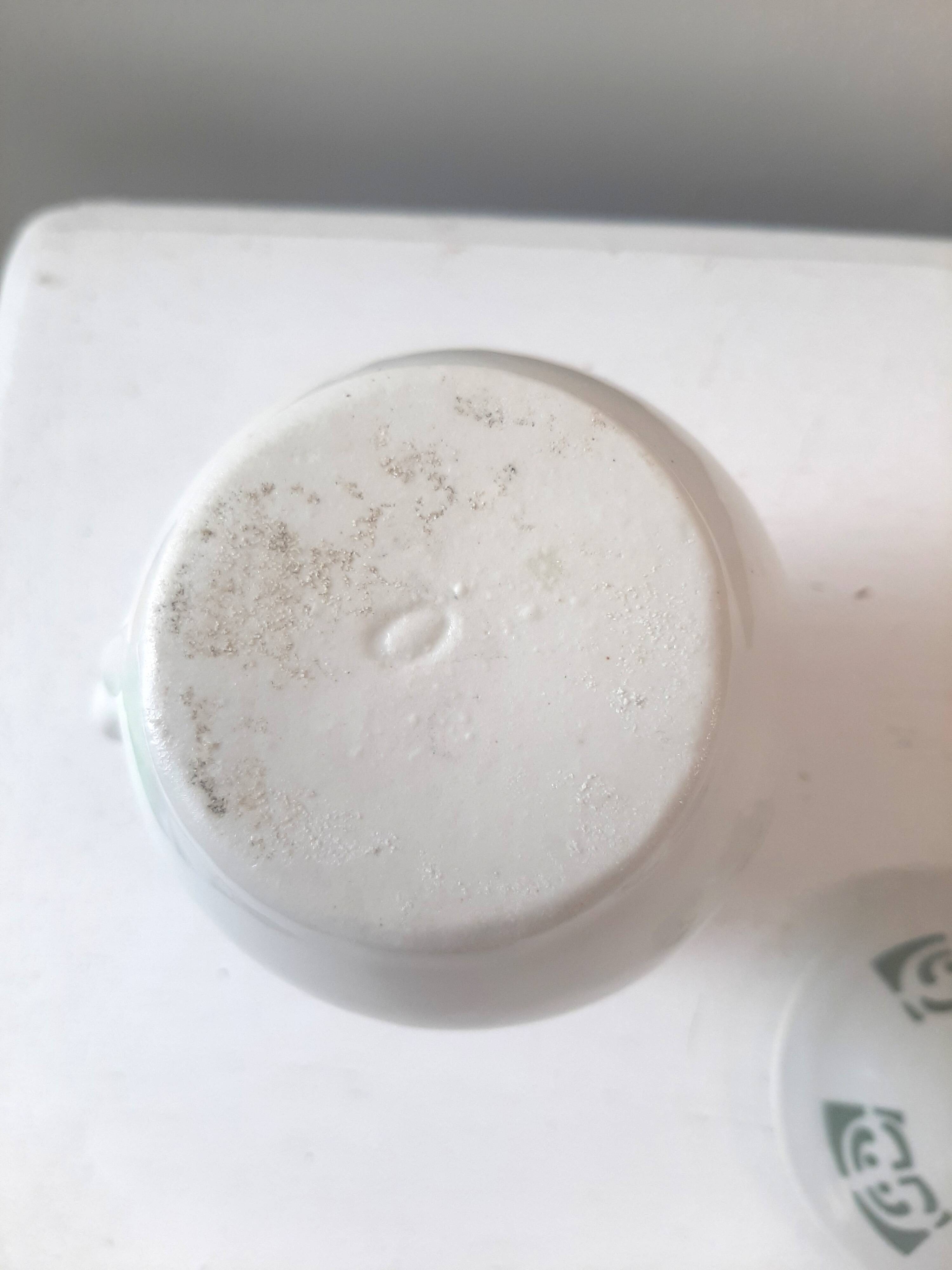 Vintage cream pot with Art Deco pattern and its lid.