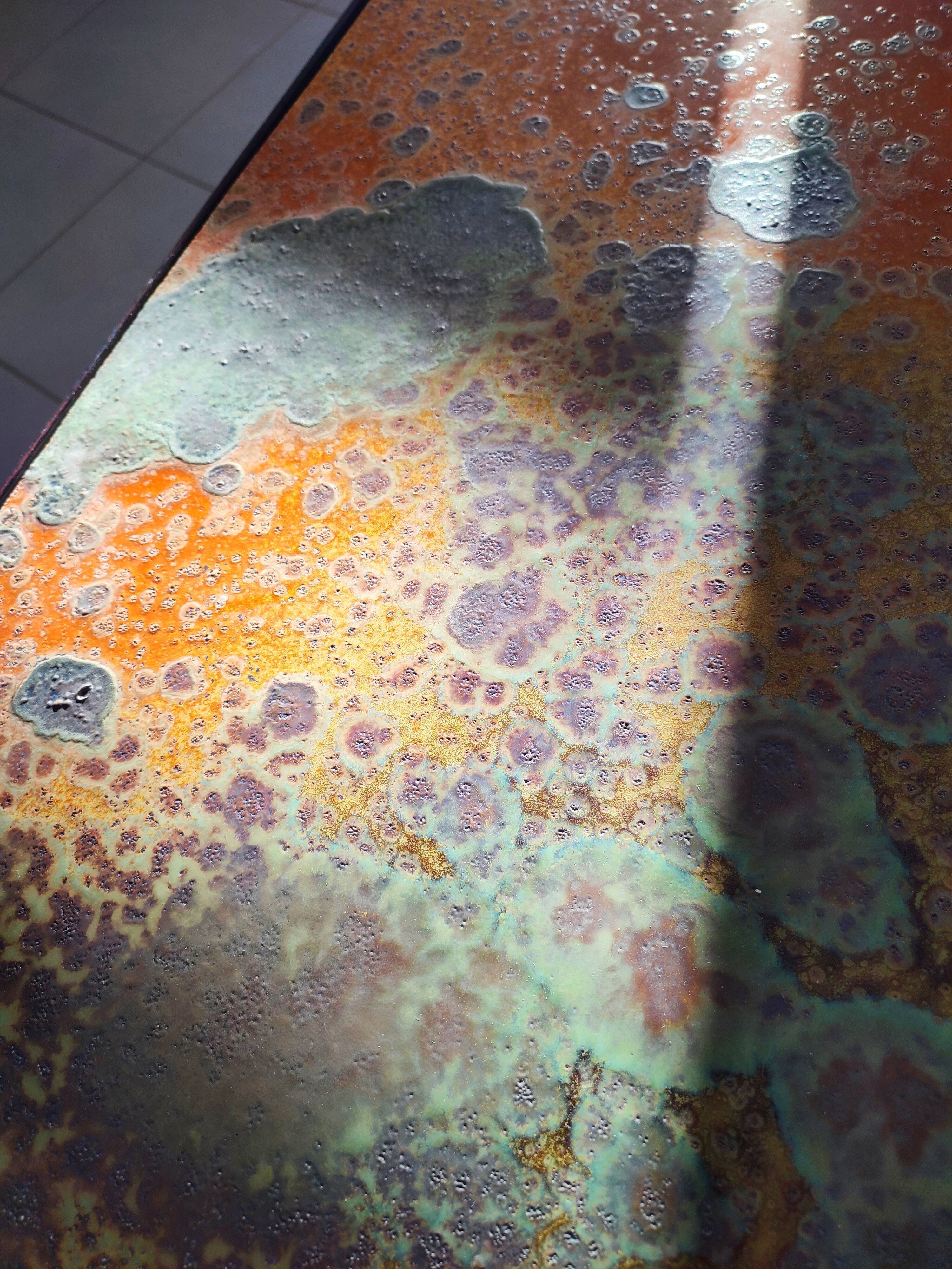 Enamelled lava coffee table