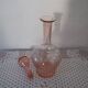 Pink transparent glass carafe with bubble cap