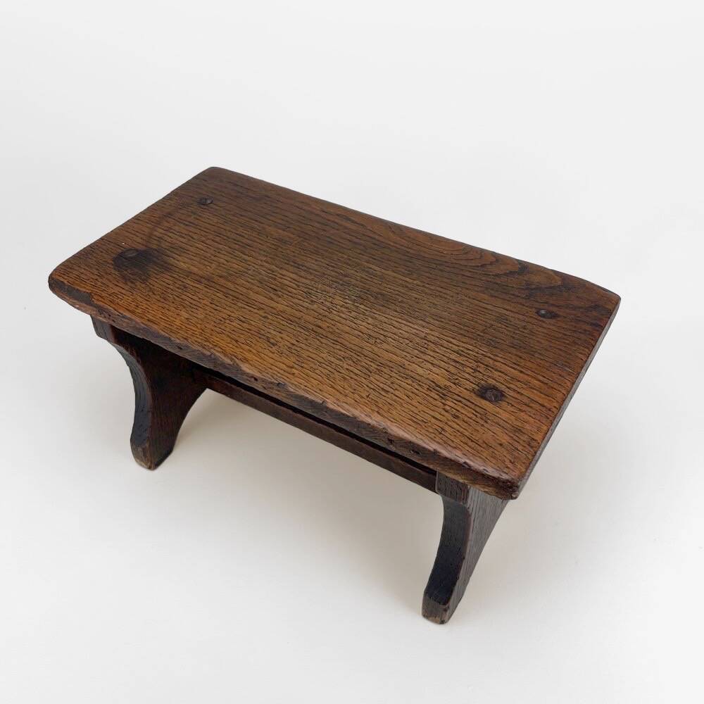 Small old wooden bench or footstool