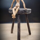 Massive black tripod stool