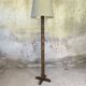 Vintage brutalist floor lamp made of turned wood.