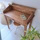 Solid wood tiered desk in a country style