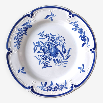 Decorative blue and white earthenware plate