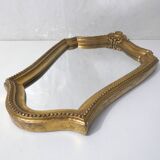 Antique Louis XV style mirror, vintage carved gilded wooden frame with pearls