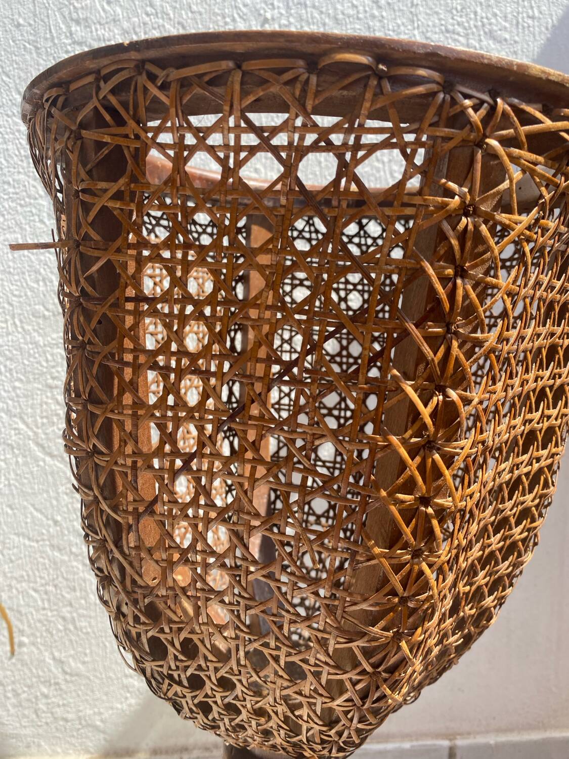 Italian plant holder in woven rattan