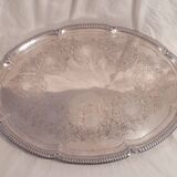 Very large quadripod oval serving tray in rococco style/silver metal